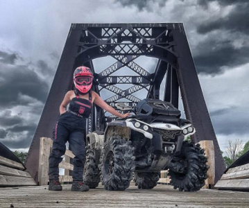 Beautiful girl and ATV